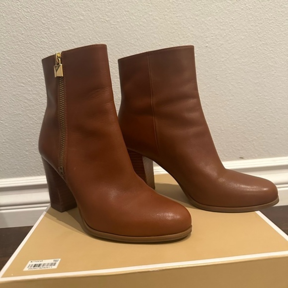 Michael Kors Brown Ankle Booties with Sleek Silhouette and Gold Zipper